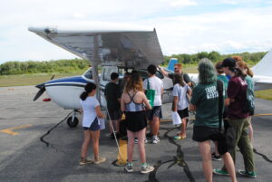 Patrick MacAlister describes the construction of this Cessna airplane to Marshfield Scouts. 