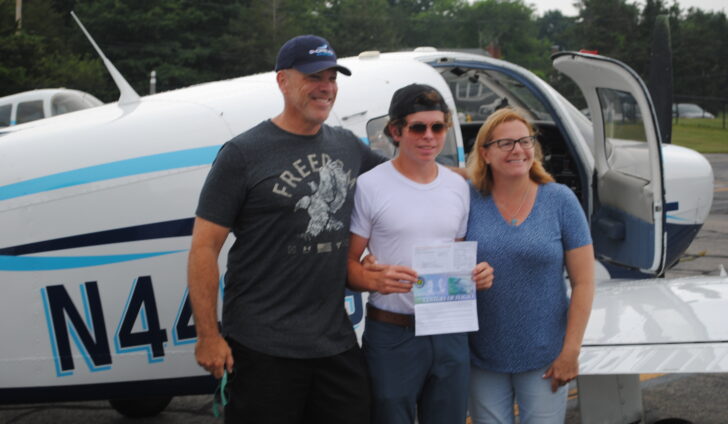 Proud parents Mark and Julie Stiles congratulate their son Tim after his successful inaugural solo flights.