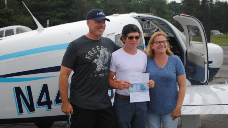 Proud parents Mark and Julie Stiles congratulate their son Tim after his successful inaugural solo flights.