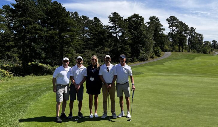 P.J. Flanagan, left, Steve Nery, Steve Swiech and Keith Douglass to help raise funds for the MBAA Aviation Scholarship Fund. Here, they surround Shoreline associate Erin Mulcahy.