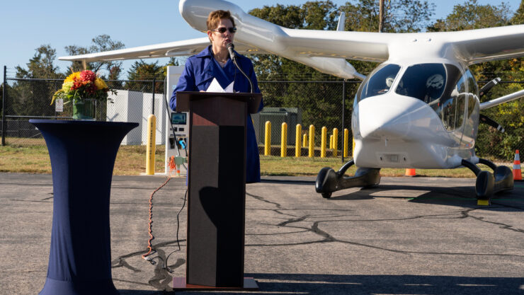 FAA New England Region Administrator Colleen D’Alessandro offers remarks during Shoreline Aviation’s commissioning of BETA Technologies electric aircraft charging station. Photo courtesy of BETA Technologies