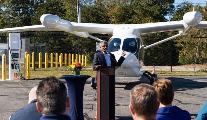 Tilak Subrahmanian discusses Eversource’s role in providing power for Shoreline Aviation’s electric charging stations made by BETA Technologies. Photo courtesy of BETA Technologies