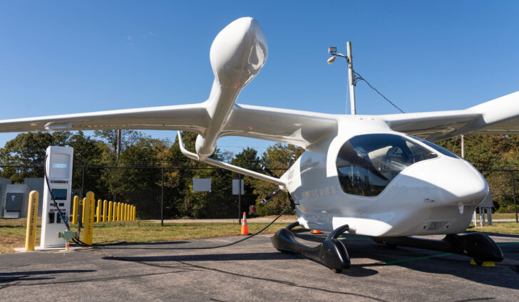 BETA Technologies’ developmental electric aircraft ALIA is charging at KGHG’s Level 3 charging station. Photo courtesy of BETA Technologies