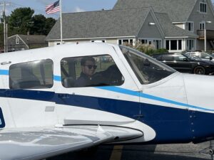 Flight instructor Vince King smiles after another great flight with student Una Delabruere. 