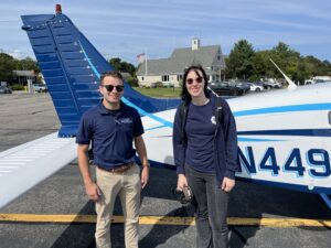 Flight instructor Vince King and student Una Delabruere are all smiles after their third flight together.