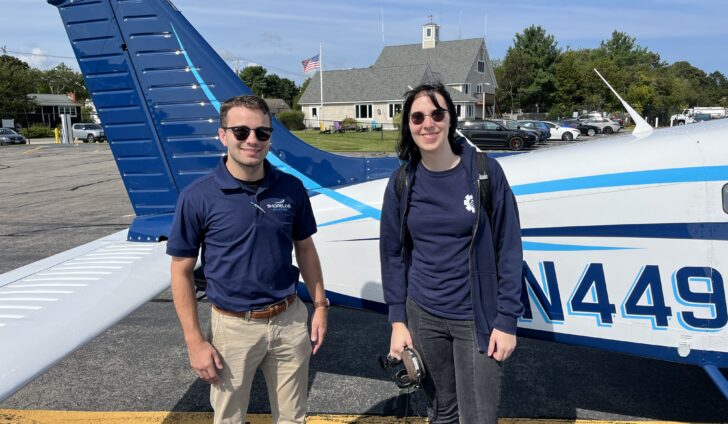 Flight instructor Vince King and student Una Delabruere are all smiles after their third flight together.