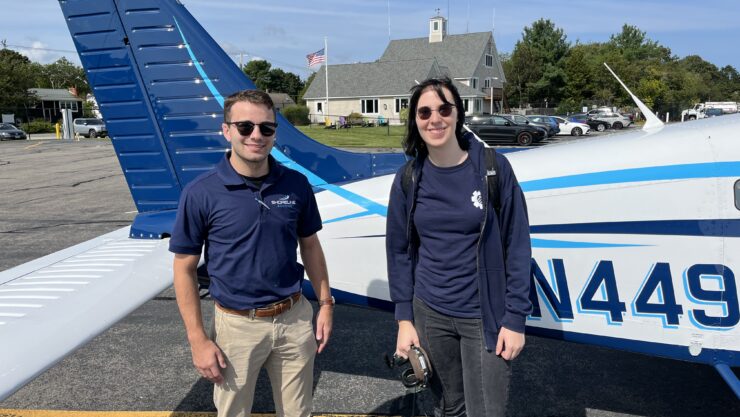 Flight instructor Vince King and student Una Delabruere are all smiles after their third flight together.