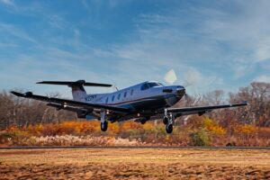 Shoreline Aviation’s charter fleet Pilatus PC-12NG takes off. 
