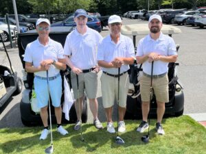 Shoreline Aviation foursome Keith Douglass, left, Patrick Olson, Mike James, and Steve Dery prepare to head out to the course for the Boys & Girls Club of Marshfield 11th annual Golf Classic.