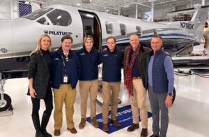 Shoreline Aviation President Keith Douglass, right, and members of Shoreline’s PC-12 team, pose with the fleet’s new PC-12 NGX.