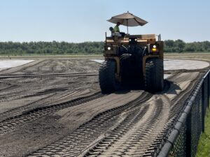 A second milling machine tears up the old main ramp surface. 