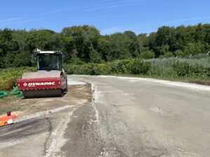 The back entrance road to the east ramp is prepared for paving. 