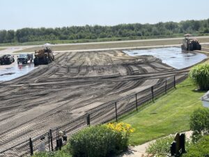A second milling machine tears up the old main ramp surface. 
