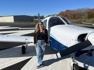 Andrea Hewett has her private and commercial certificates and has flown over 300 hours