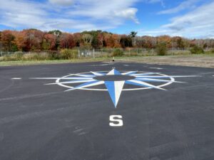This compass rose on the east ramp leaves no question as to which way is north.