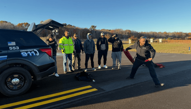 Marshfield Police officers train in STOP STICK deployment at Marshfield Airport.